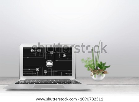Laptop on wooden desk