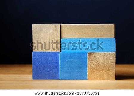 Toy blue wooden blocks abstract stack background