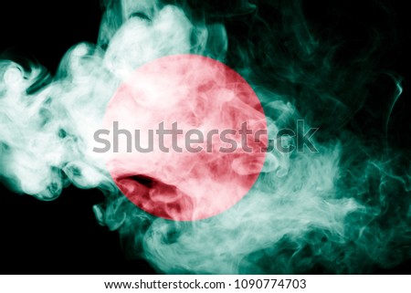 National flag of Bangladesh from thick colored smoke on a black isolated background