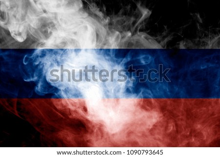 National flag of Russia from thick colored smoke on a black isolated background