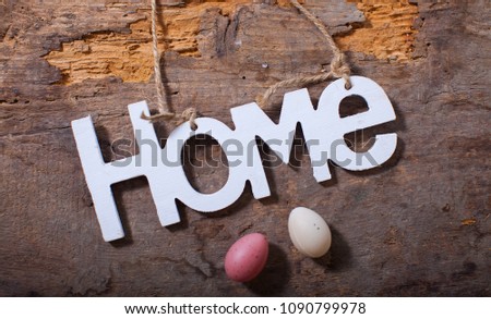 White wooden letters "HOME"
