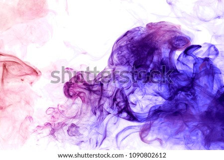 Thick pink and blue  colorful smoke  on a black isolated background. Background from the smoke of vape
