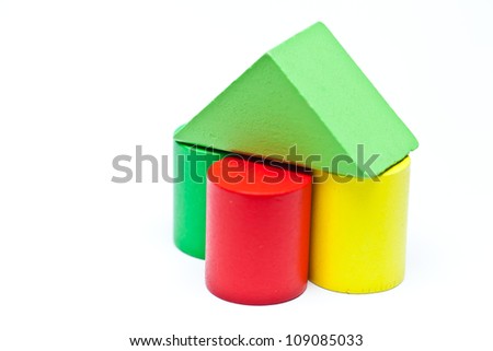 Wooden toy blocks isolated on white background.
