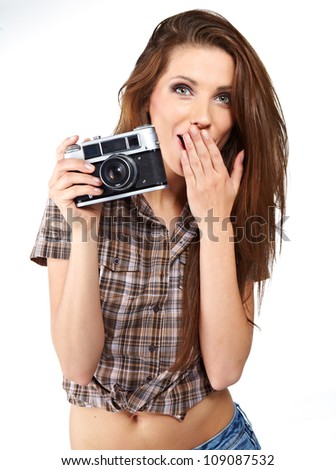 Beautiful young woman with camera.