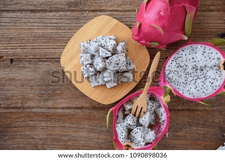 Dragon fruit on wooden background.