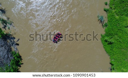 Rafting on the river. An aerial view tourist activities in the Melen river for rafting sports. Aerial photography. Aerial view of rafting on a catamaran on the rapids river. 