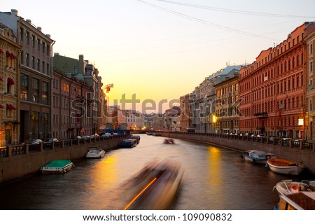 Sunset in the city on the river. (Fontanka River, St. Petersburg, Russia) Royalty-Free Stock Photo #109090832