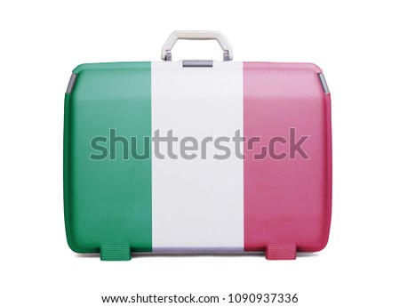 Used plastic suitcase with stains and scratches, printed with flag, Italy