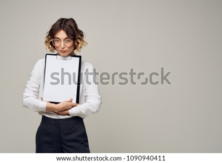 clean sheet of paper in the hand of a business lady                            
