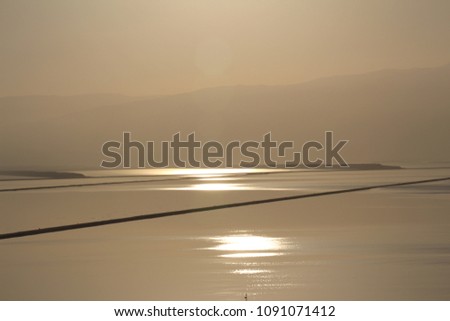 Sunrise at the Deadsea. This pictures was taken on morning of  5/15/2018. You can see the mountains of Jordan