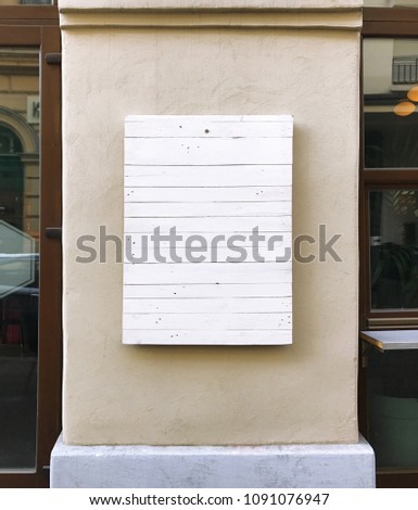 white wood pattern board on the wall