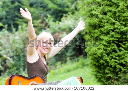 girl with guitar outdoor