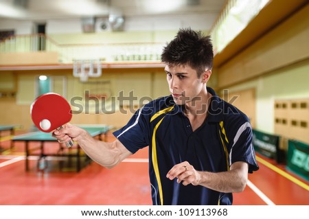young man tennis-player in play on chroma key Royalty-Free Stock Photo #109113968