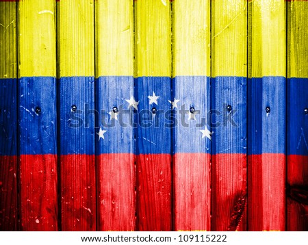 The Venezuelan flag painted on wooden fence