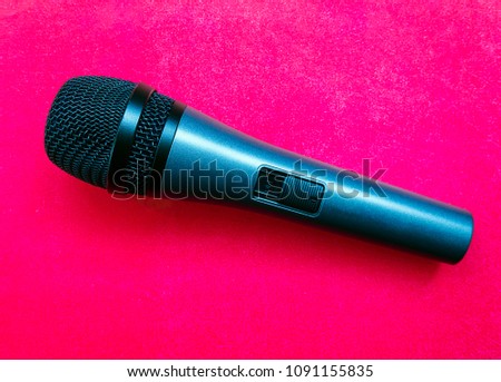 Microphone on bright background