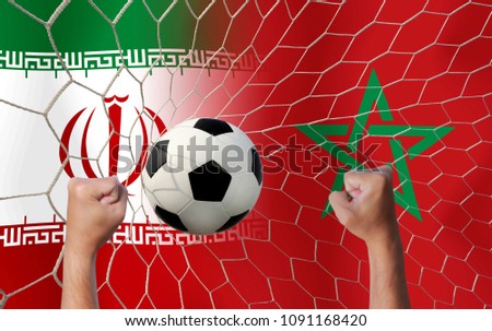 Blur handful cheer of Football Cup competition between the national Morocco and national Iran.