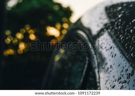 Bokeh of rain on the car glass