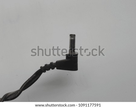 Black color power plug adapter jack on white background