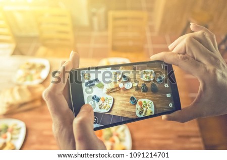 taking photo at breakfast on table