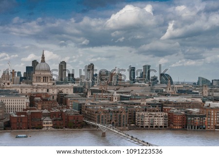 Aerial view of north bank of the river Thames, St Paul's Cathedral and The Millenium Bridge in London