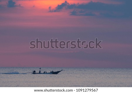Boat at sunset.