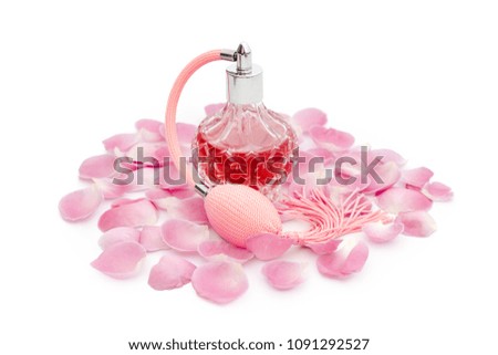 Perfume bottle with flower petals on white background. Perfumery, cosmetics, fragrance collection