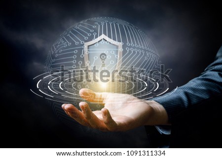 Hand showing the shield for protecting information systems.