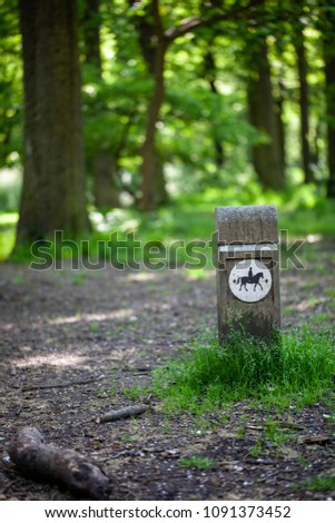 Bridlepath marker sign on a wooden post