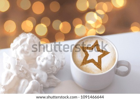 coffee with a picture of a star from cinnamon