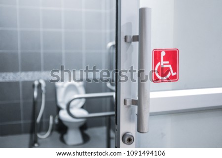 Bathroom sign for disabled.