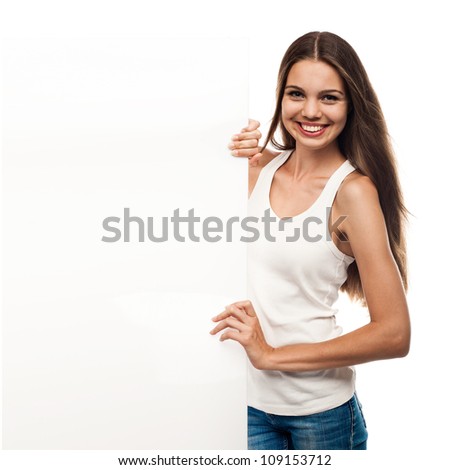 Portrait of a beautiful young woman with blank billboard isolated on white background