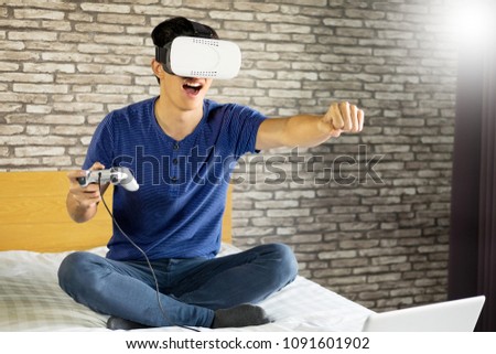 The VR headset design is generic and no logos, Man wearing virtual reality goggles watching movies or playing video games, double exposure effect.