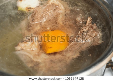 meat is brewed in broth close up
