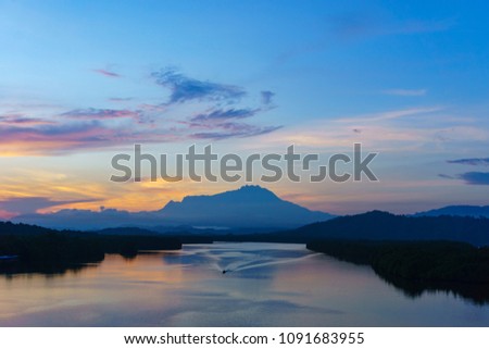 Majestic Mount Kinabalu with beautiful Twilight Sunrise and amazing sky clouds, Tuaran,Sabah,Borneo (Soft Focus)