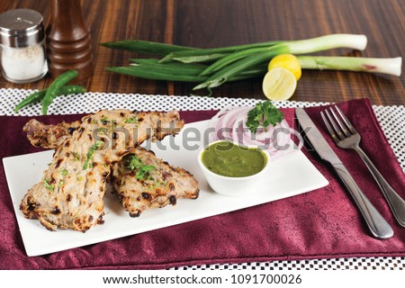 Afghani Chicken With Green Sauce Royalty-Free Stock Photo #1091700026