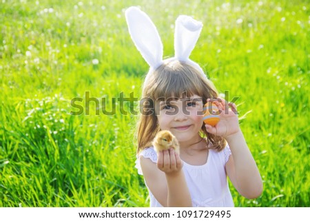 Child with rabbit ears. Easter. Selective focus. 