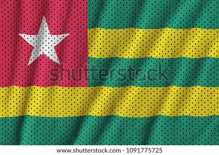 Togo flag printed on a polyester nylon sportswear mesh fabric with some folds