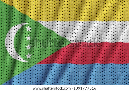 Comoros flag printed on a polyester nylon sportswear mesh fabric with some folds