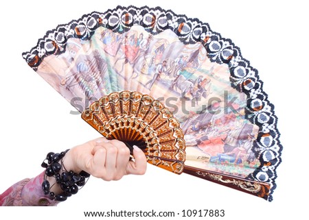 national gypsy fan in dance with a beautiful woman hand on white isolated background