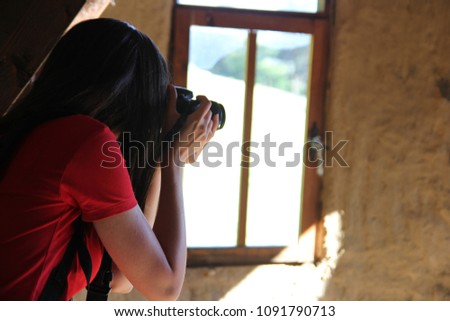 Girl is photographer