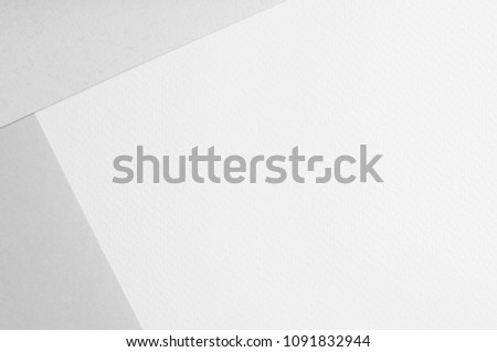 grey paper overlay on white paper texture background