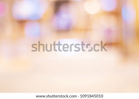 Abstract background of shopping mall, shallow depth of focus. Blurry focus effect bokeh and beautiful luxury retails store interior for background.