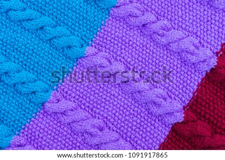 Texture of knitted woolen fabric for wallpaper and an abstract background