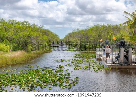 Airboats tours in Everglades National Park, Florida. Royalty-Free Stock Photo #1091947205