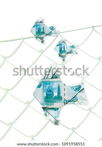 Floating in the water origami fish made from banknotes of the Bank of Russia denomination of 1000 rubles against the background of the cells of the fishing net. 3d illustration, isolated 