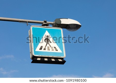 sign pedestrian road with blue sky