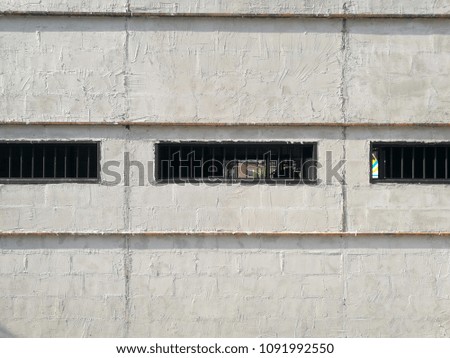Window of light grey concrete wall texture background