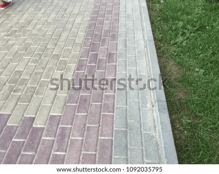 paved with tiles path in the Park