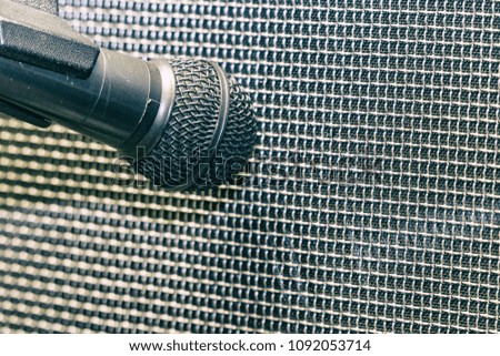 The microphone before the lining of the speaker