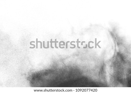   particles of charcoal on white background,abstract powder splatted background,Freeze motion of black powder
